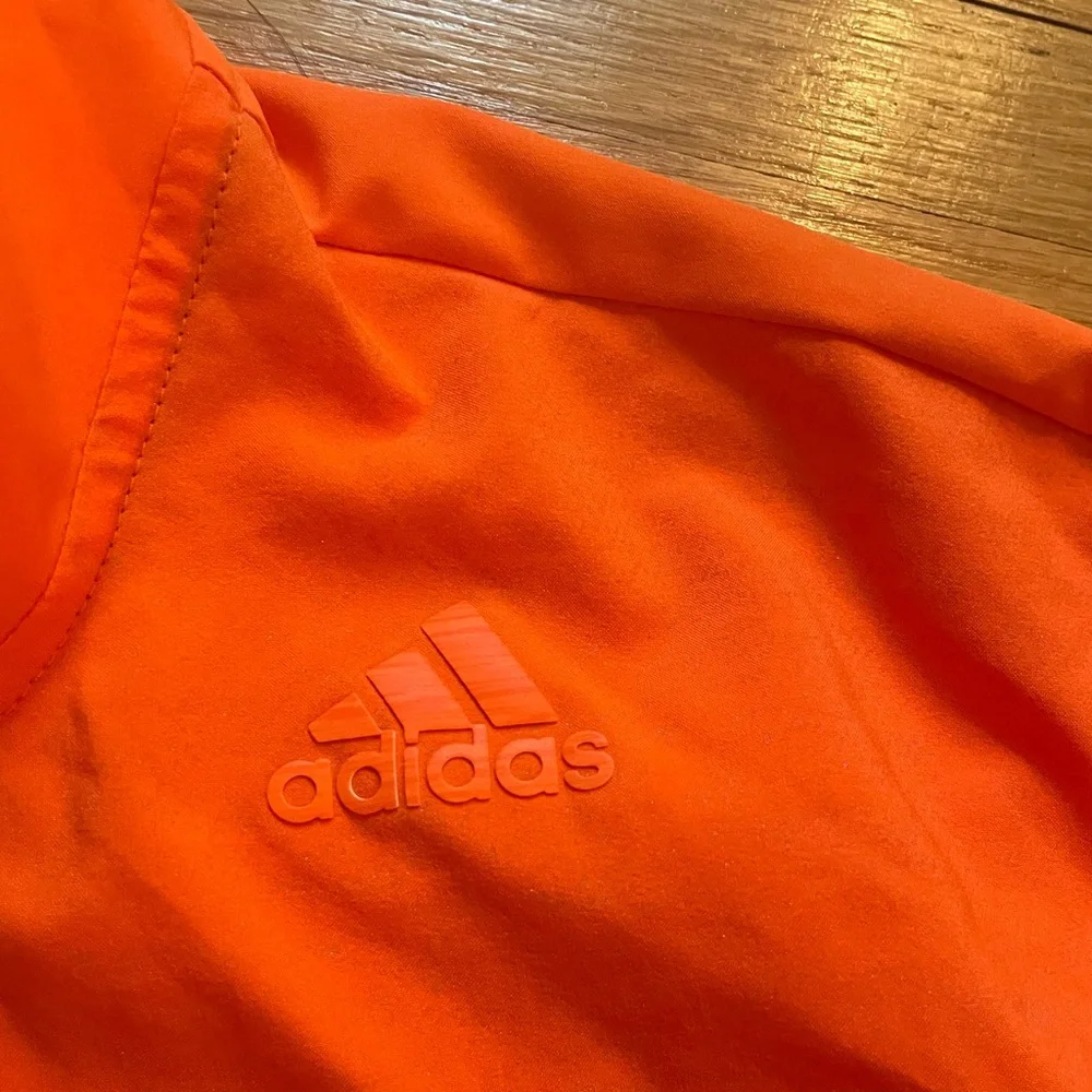 ADIDAS “supernova” lightweight running zip up jacket /orange w/reflective thread